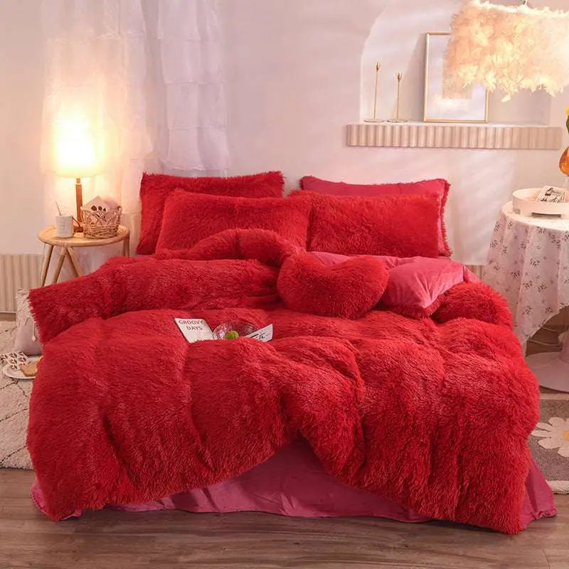 Pink fluffy faux fur plush duvet cover set with red fluffy duvet and matching pillows including heart accent pillow