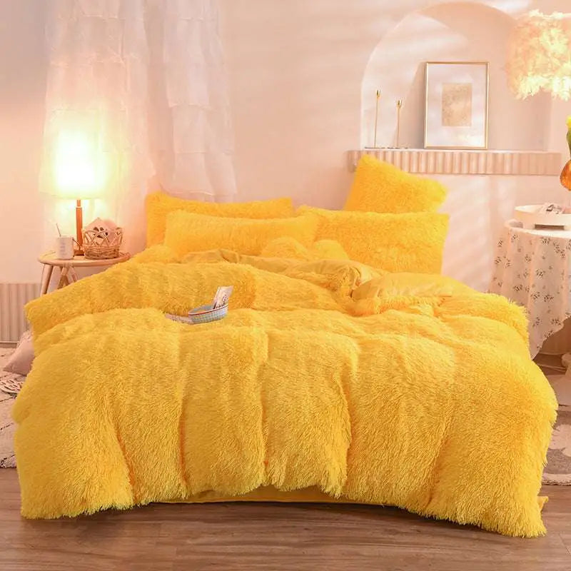 Bright yellow plush duvet cover set with matching pillows featuring fluffy faux fur material for cozy comfort