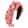 Pink gingham fashion knotted fabric easter headband with yellow plaid, purple rhinestones, colorful pins, and gold-tone hardware