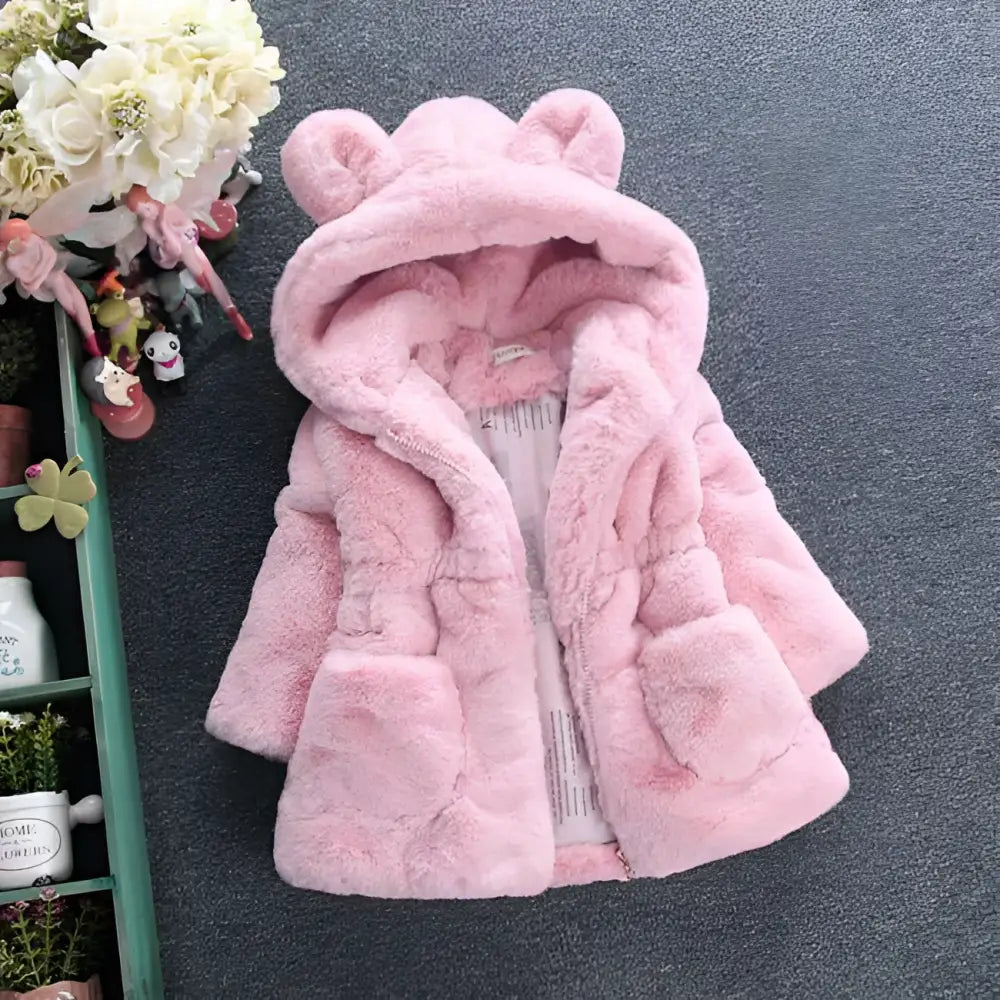 Pink girls fuzzy bear ear hooded coat in pink faux fur with front pockets and cozy ear hooded fur design