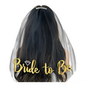 Sheer pink gold foil bride veil with diamond-shaped embellishment on popular tulle for bridal occasions