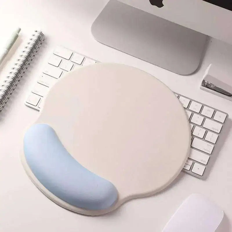 Beige and light blue memory foam soft mouse pad with contoured wrist rest for wrist health in pink gradient memory style