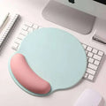 Pink gradient memory foam soft mouse pad in pastel blue and pink with ergonomic contoured wrist rest for wrist health