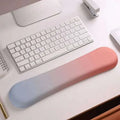 Pink gradient memory foam soft mouse pad with pastel silicone wrist rest for enhanced wrist health and smooth texture