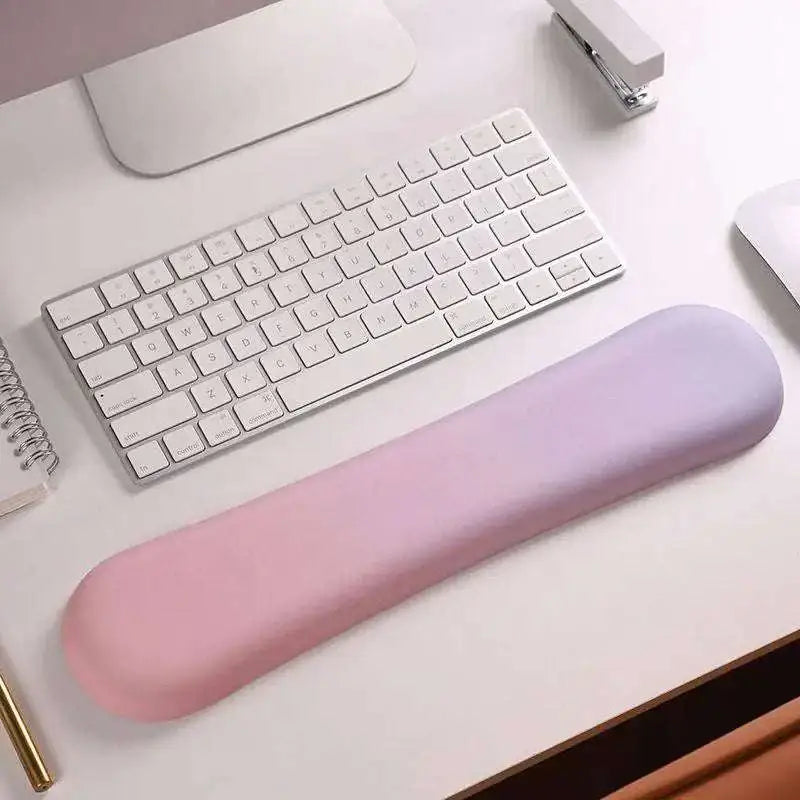 Pastel pink and lavender gradient memory foam soft wrist rest for ergonomic support promoting wrist health