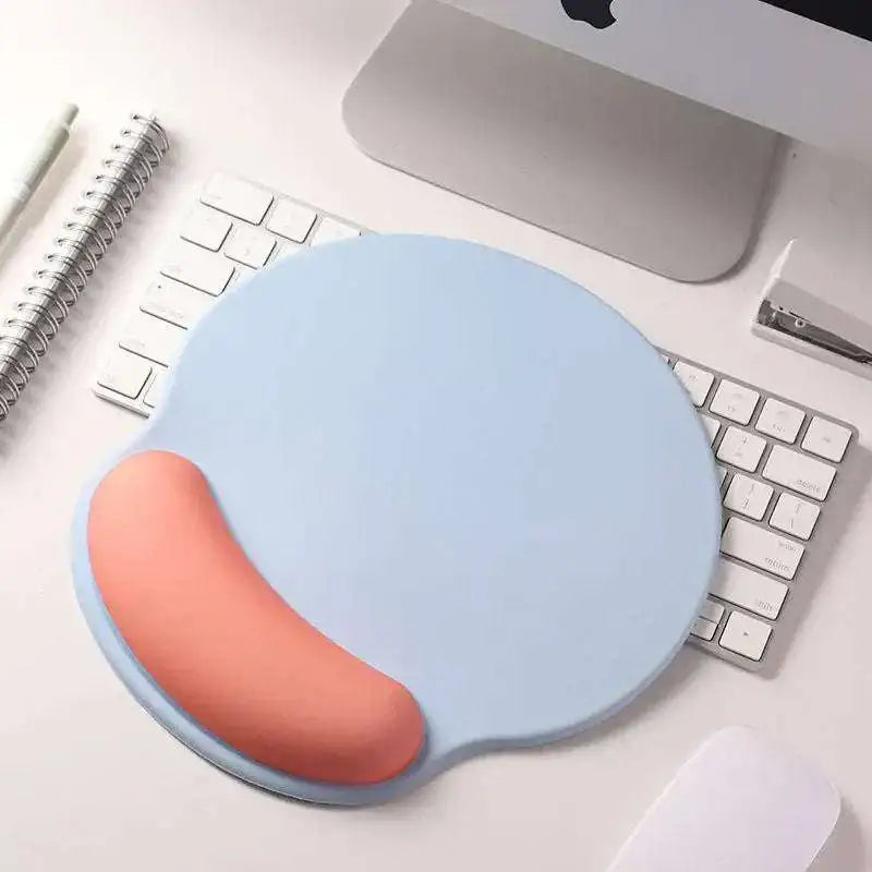 Light blue ergonomic memory foam soft mouse pad with peach wrist rest designed for wrist health and comfort