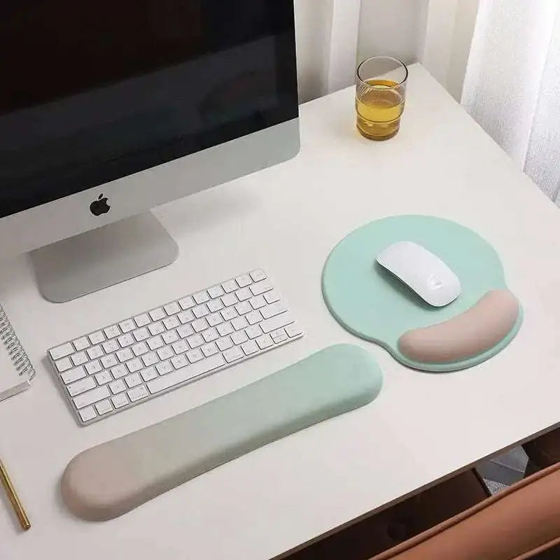 Mint green and beige ergonomic gel mousepad with integrated wrist rest promoting wrist health and memory foam soft comfort