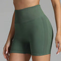 Olive green high waist seamless yoga shorts with ribbed waistband and mesh side panel for women