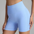 Light blue high waist seamless yoga shorts with ribbed waistband and textured side panels for women