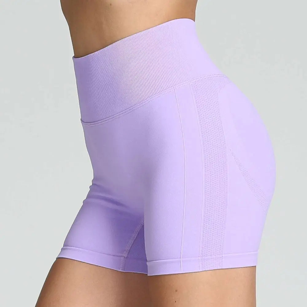 Lavender high waist seamless yoga shorts with ribbed waistband and mesh panel detailing for women