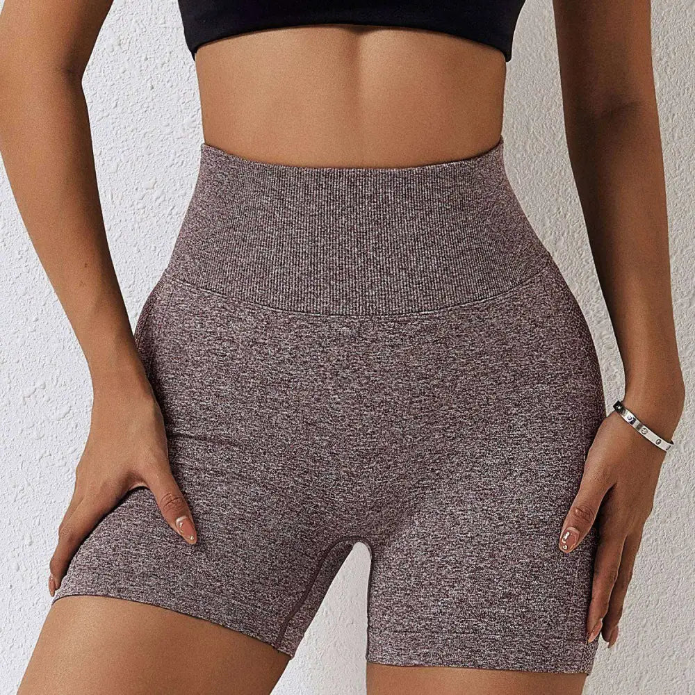 High-waisted heathered gray seamless yoga shorts for women with ribbed waistband and comfortable fit