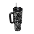 Black insulated tumbler with silver leopard print featuring a steel handle straw and black lid from Pink Kiss collection