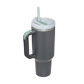 Gray insulated tumbler with light green accents and white lid featuring a pink kiss steel handle straw integrated design