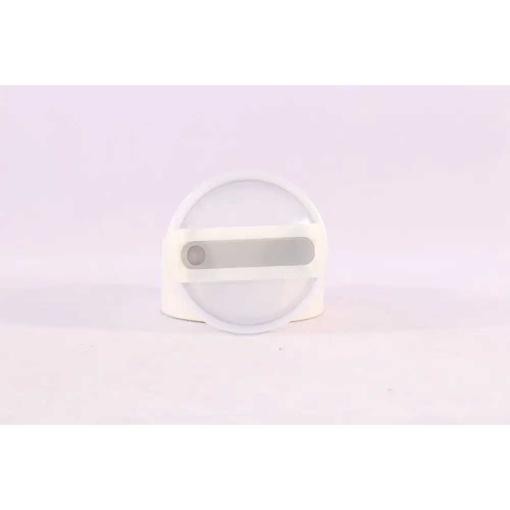White silicone ring with clear lens and gray accent on pink kiss insulated tumbler with stainless steel handle straw