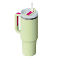 Light green insulated tumbler with steel handle straw white lid pink kiss accents pink kiss stainless steel handle straw