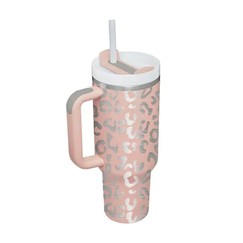 Pink kiss insulated tumbler with steel handle straw featuring pink insulation and silver leopard print pattern