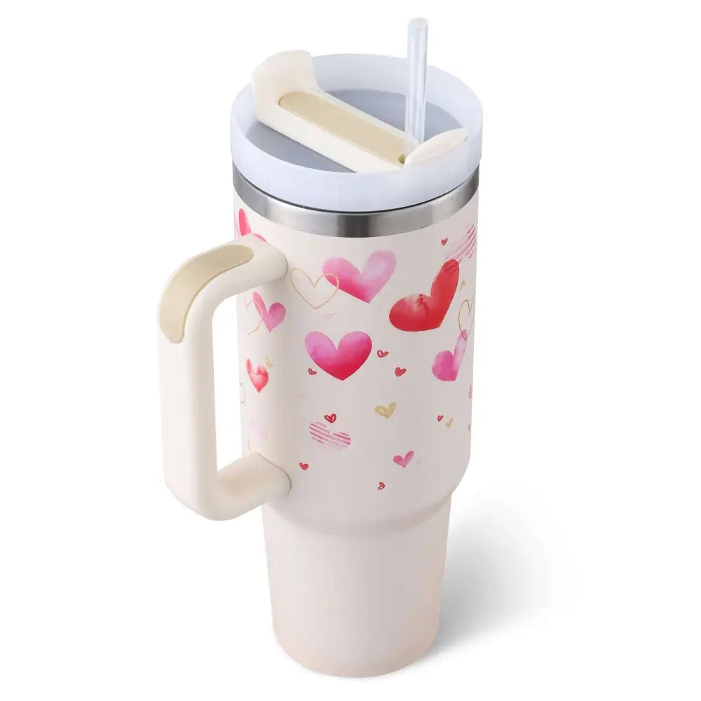 White insulated tumbler with steel handle straw featuring pink kiss watercolor hearts for stylish hydration