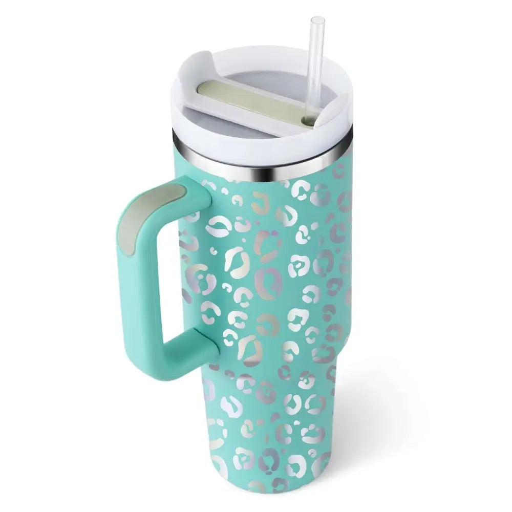 Teal insulated tumbler with leopard print and white steel handle straw lid from pink kiss stainless steel series
