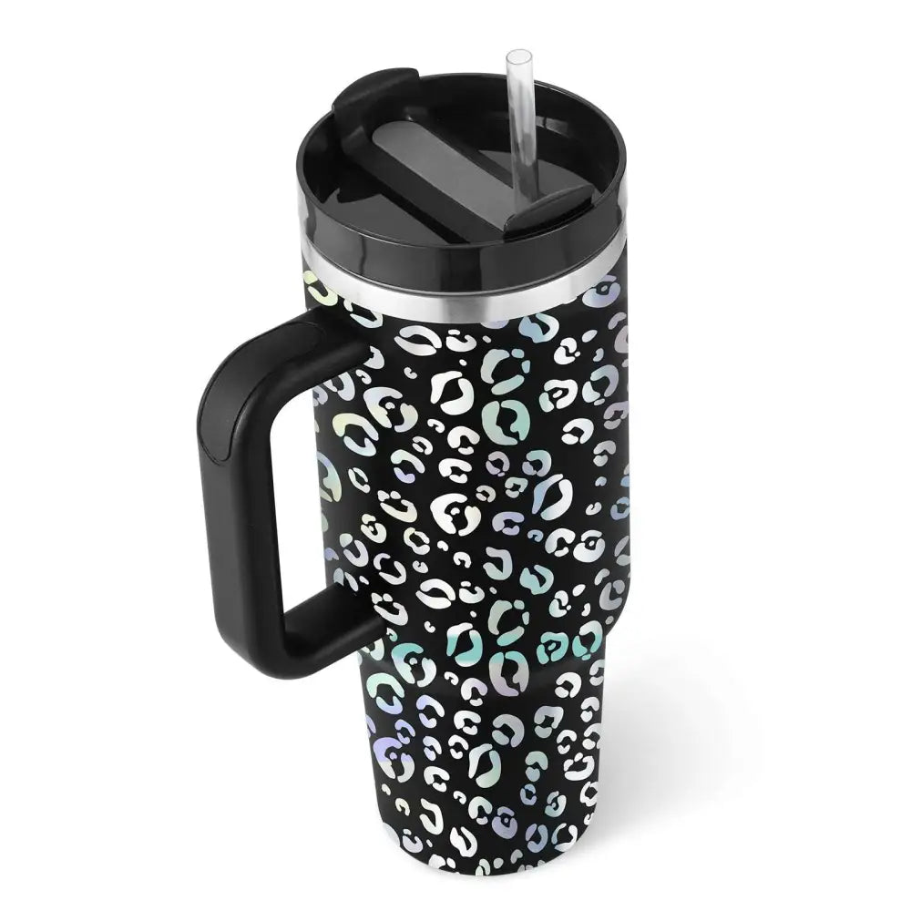 Black insulated tumbler with steel handle straw featuring pink kiss iridescent leopard print in white and teal accents