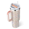 Pink kiss insulated tumbler with pink leopard print steel handle and white lid featuring orange straw slot