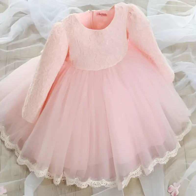 Delicate pink lace princess dress girls long sleeve with lace detailing and voluminous tulle skirt perfect for summer