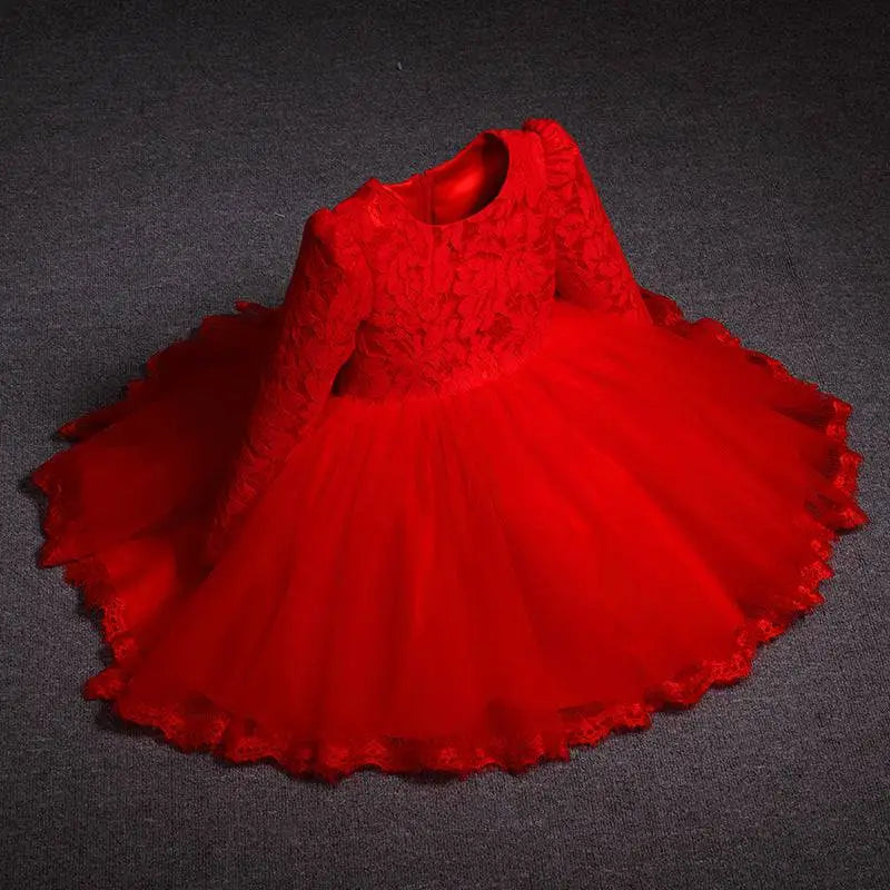 A vibrant pink lace princess dress girls summer style with long lace sleeves and a voluminous tulle skirt