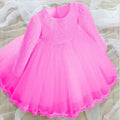 A vibrant pink lace princess dress girls long sleeve with layered tulle skirt and delicate lace trim hem
