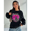Black oversized crew neck sweatshirt featuring bold pink lips and vintage microphone graphic on leopard print background