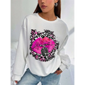 White oversized crew neck sweatshirt featuring pink lips and vintage microphone graphic with black pink leopard print background
