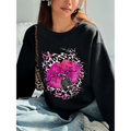 Black oversized crew neck sweatshirt featuring vibrant pink lips with leopard print and vintage microphone design