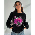 Black oversized crew neck sweatshirt featuring vibrant pink lips and leopard pattern graphic for casual wear