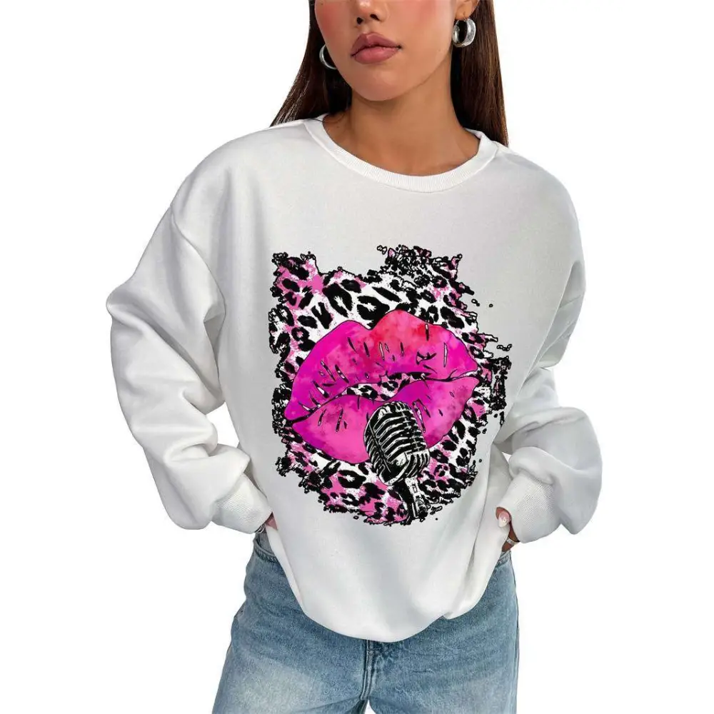White oversized crew neck sweatshirt with pink lips and vintage microphone graphic on black and pink leopard print background