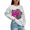 White oversized crew neck sweatshirt with bold pink lips and leopard print accents featuring a vintage microphone design