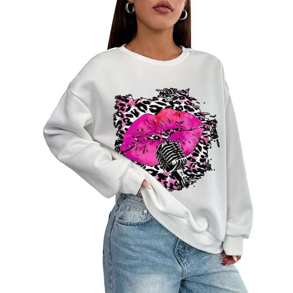White oversized crew neck sweatshirt with bold pink lips and leopard print accents featuring a vintage microphone design