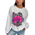 White oversized crew neck sweatshirt with pink lips and vintage microphone graphic on splattered leopard print background