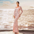 A shimmering pink long sleeve sequined sheath fishtail evening dress with square neckline and mermaid silhouette