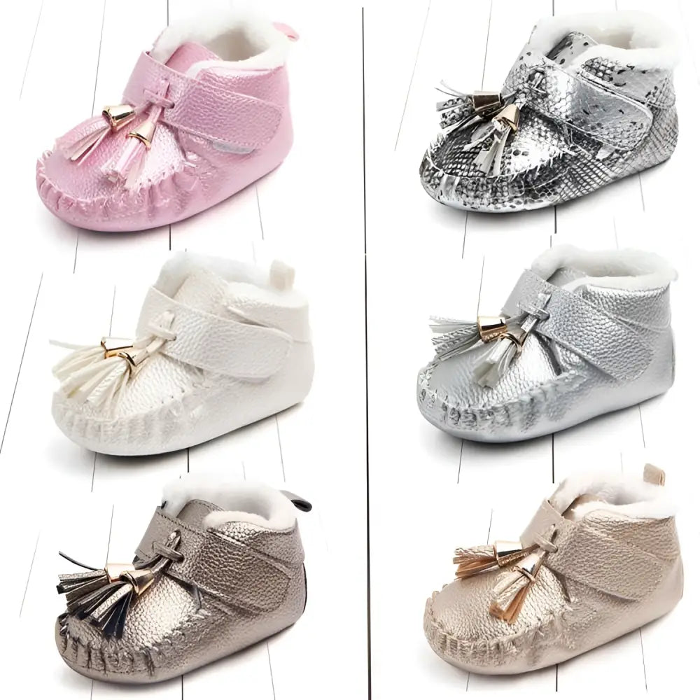 Pink metallic tassel baby shoes with soft white fur lining designed for stylish toddler shoes and infants