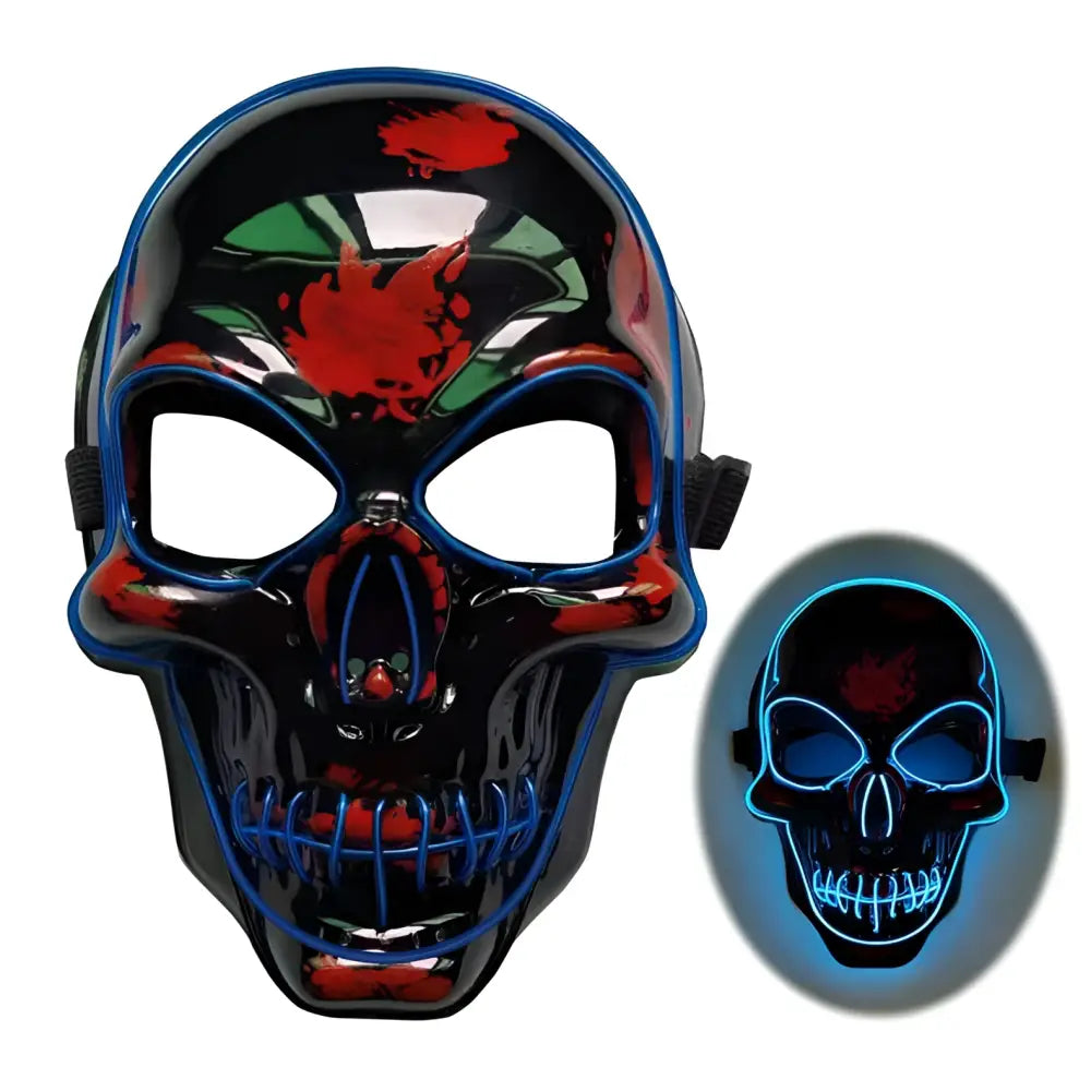 Glowing black halloween skeleton mask with blue neon led glow outlining eyes nose and teeth with red green splatter paint
