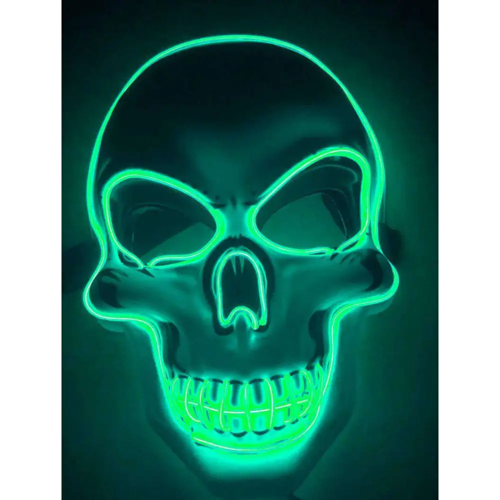 A glowing green led halloween skeleton mask with neon outlines highlighting eye sockets nose cavity and teeth