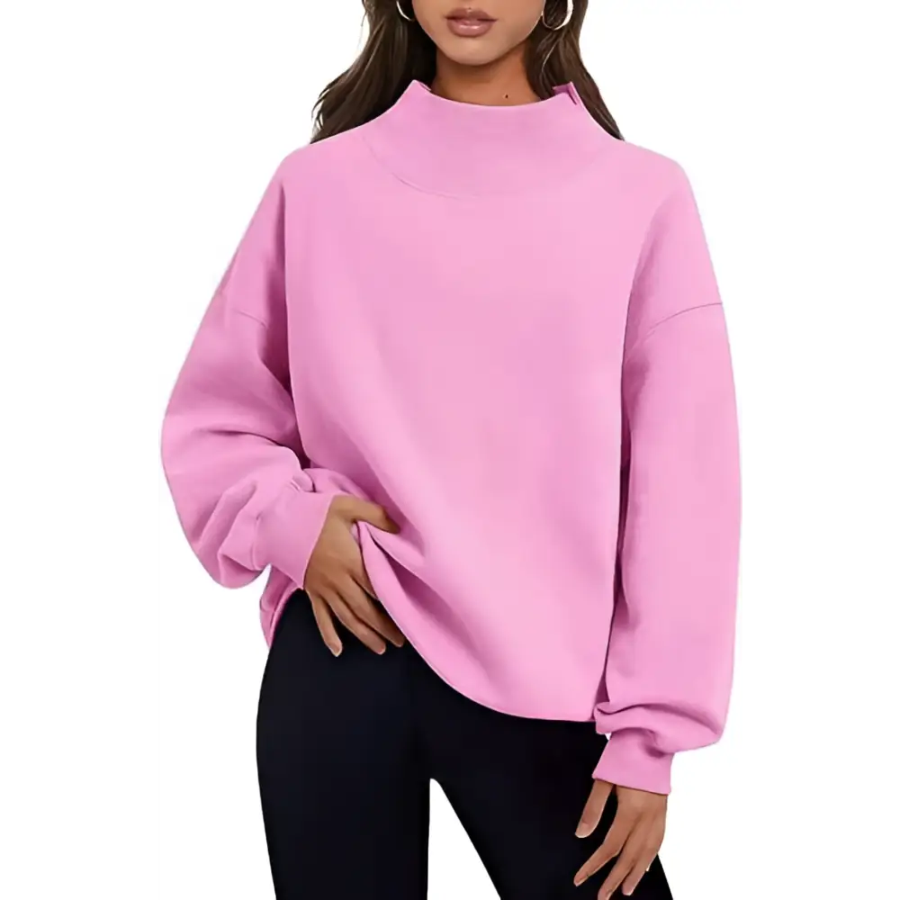 Pink oversized turtleneck pullover sweatshirt solid color with ribbed cuffs and relaxed fit for casual wear