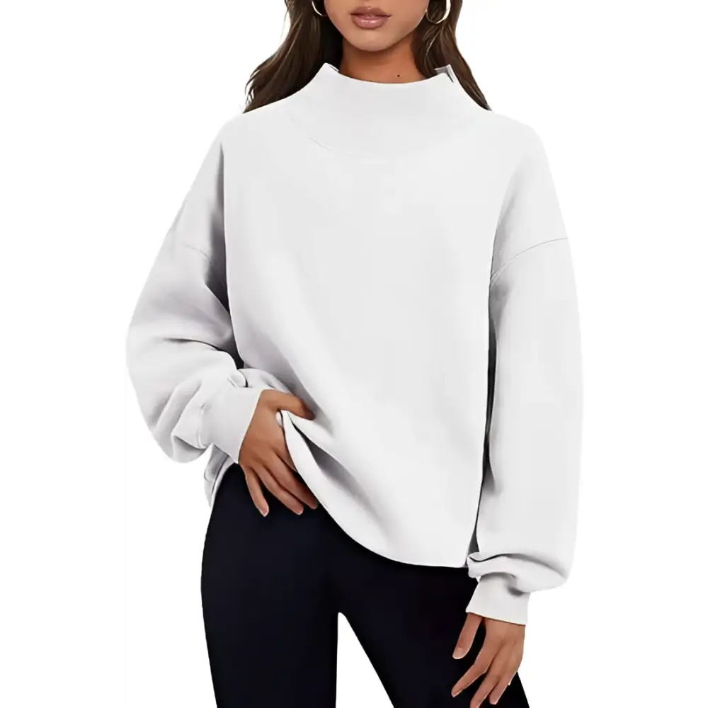 White oversized sweatshirt with high neckline ribbed cuffs and relaxed fit in pullover sweatshirt solid style