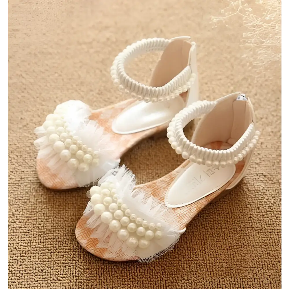 Pink pearl mesh summer girls sandals featuring white pearl-adorned floral design with delicate mesh and beaded straps