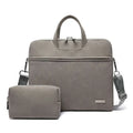Gray textured leather women laptop bag with matching pouch featuring minimalist design and adjustable shoulder straps