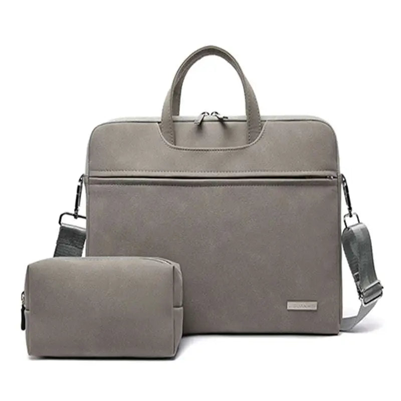 Gray textured leather women laptop bag with matching pouch featuring minimalist design and adjustable shoulder straps