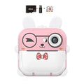 Pink rabbit polaroid children’s cartoon camera shaped like a pink and white rabbit with a bow tie design