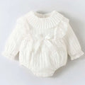 White ribbed newborn clothes jumpsuit with lace trim and central bow in pink ribbed long sleeve design