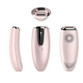 Pink rose gold handheld laser hair removal device with sleek ergonomic design and black control panel for home laser hair use