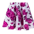 A flared white skirt with vibrant pink rose ruffled patterns in luxury women’s fashion plus size dresses