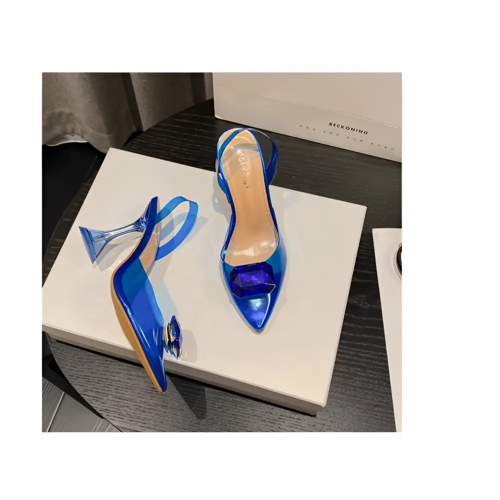 Pink satin bow high-heeled sandal featuring transparent blue material with glossy finish and decorative bow at the toe