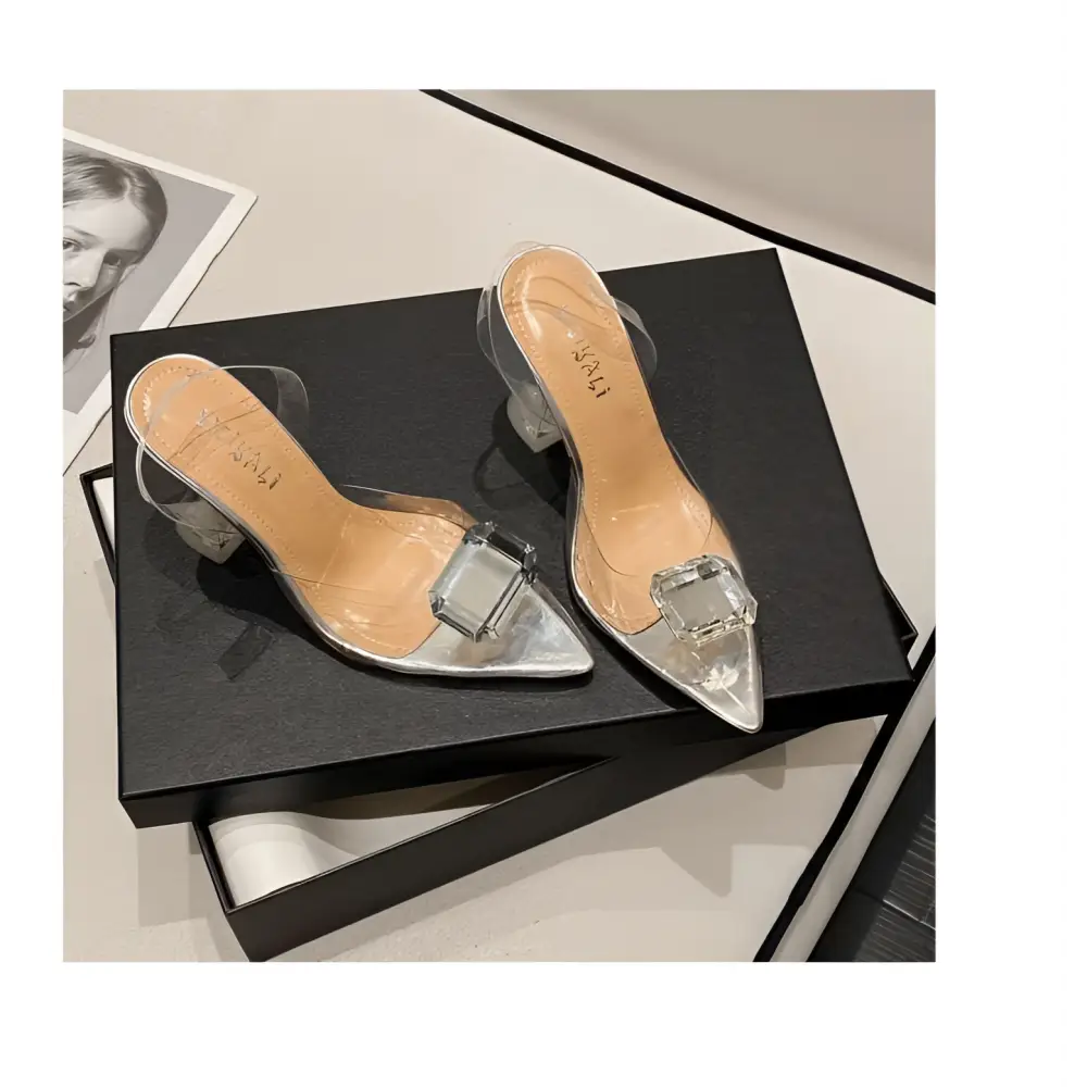 Pink satin bow high-heeled sandal featuring clear acrylic mules with transparent heel and square crystal buckle at toe